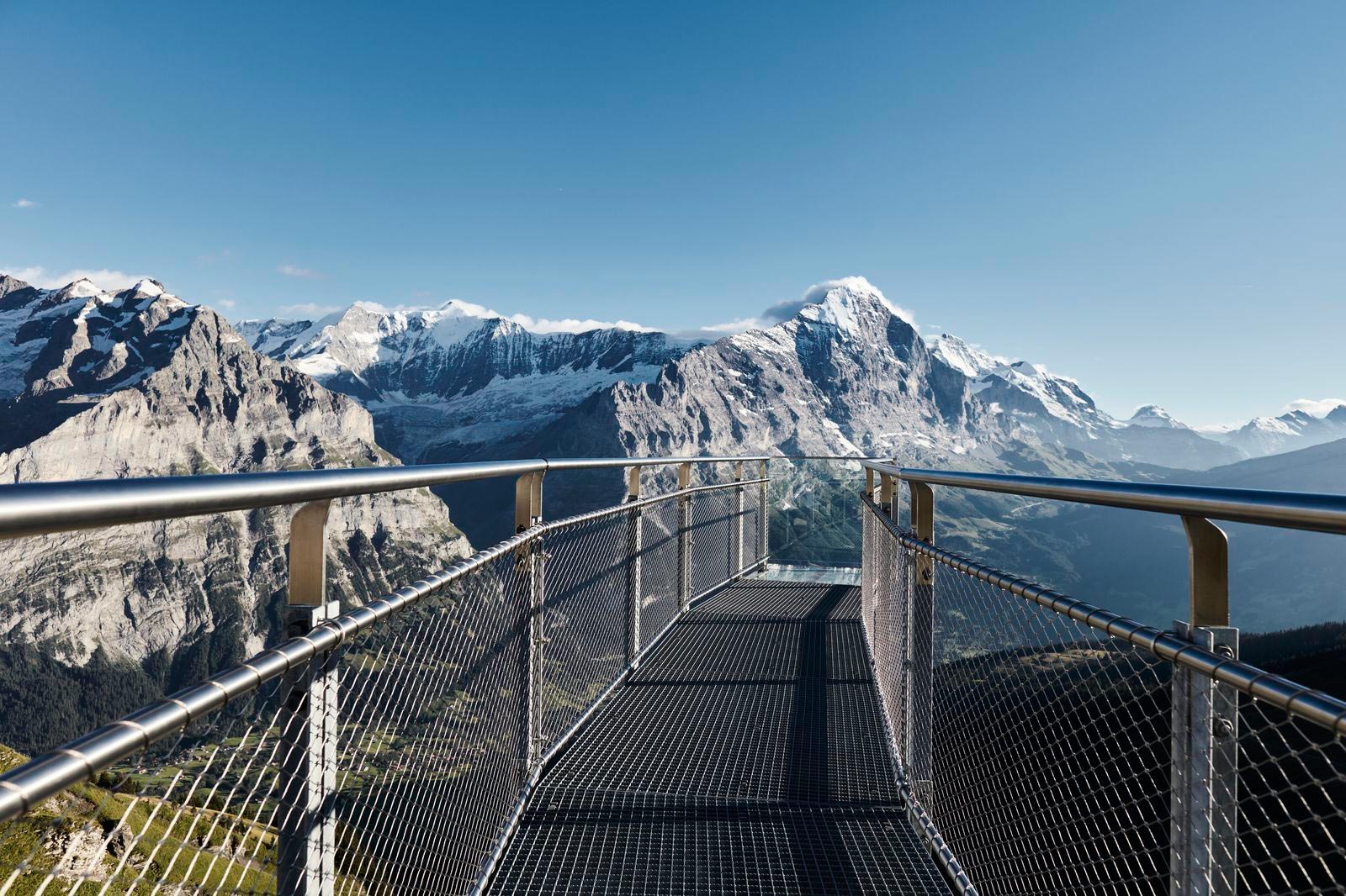 View of the mountains and the Jakob Rope Systems Webnet bridge in Grindelwald