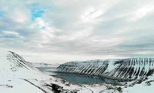 The bay and the mountains of the Ísafjarðarbær ski resort in Iceland