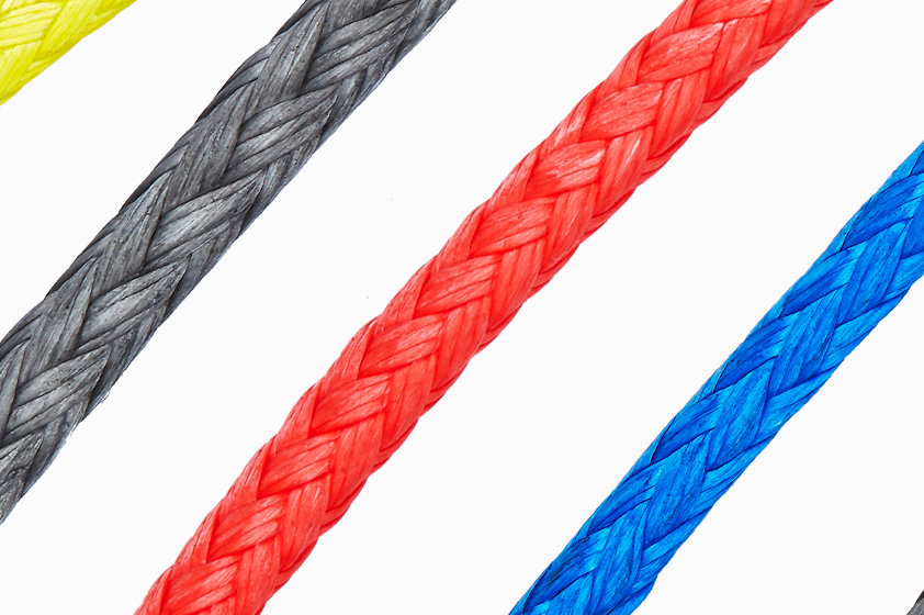 Ropes made out of various fibers in grey, red and blue