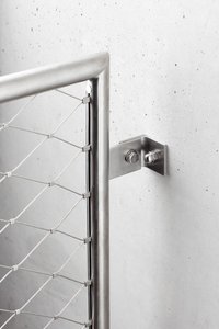 A Webnet Frame attached to a wall with a welded bracket and angle